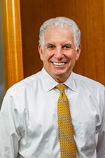 MARK L. CLASTER